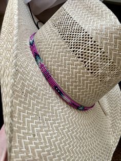 "1/4\" wide Pink Arrow Hat Band. All bead work is beaded with 10lb extreme braided nylon line. All hat bands are finished at 23\" with glued than sewed down leather ends and an adjustable leather tie." Western Style Adjustable Handwoven Hat Band, Western Woven Hat Bands For Festivals, Adjustable Handwoven Hat Bands For Rodeo, Western Handwoven Adjustable Hats, Western Style Adjustable Handwoven Hat, Handwoven Adjustable Western Hat, Adjustable Handwoven Western Hat, Adjustable Beaded Hat Bands For Rodeo, Adjustable Beaded Hat Bands For Country Events