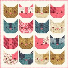 a cat quilt is shown with many different colors