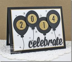 a birthday card with balloons and the words celebrate written in black, gold and white