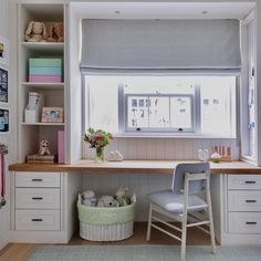 a room with a desk and shelves filled with stuffed animals