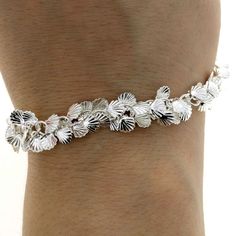 "This Metal Shell chain bracelet is made up of several Small shell charms giving a statement piece of jewelry. * Bohemian Style Jewelry * * Bracelet Length: 6.2\" + 1.5\" Extender Chain. *Metal Charms: 925 Sterling Silver Plated. * Dimensions of shells: 6.5x6 mm * Inside diameter of a link: 3.6 mm * Diameter of the wire of a link: 0.7 mm * Cadmium-free - Lead-free - Nickel free * All costume jewelry needs special treatment, therefore handle with care and avoid water, shampoo, perfume, and sea sa Pinterest Jewelry, Bohemian Style Jewelry, Birthday Gift For Women, Bronze Jewelry, Swarovski Necklace, Bracelet Women, Shell Bracelet, Jewelry Statement, Statement Bracelet