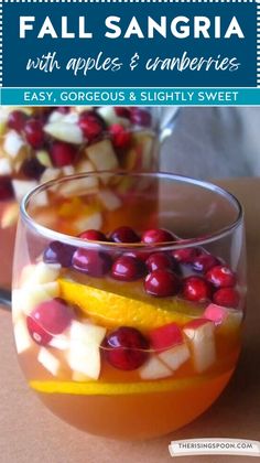 fall sangria with apples, cranberries and oranges