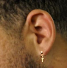 Small hanging cross stud earring for men. Mens cross dangle earring is a great way to add a touch of mens style and masculinity to your look. Whether you're looking for a minimalist or a bold statement, mens cross earrings are a great choice. From classic bold to minimalist, modern designs, there's something for everyone. With a variety of sizes, styles, and materials, you can find the perfect pair of mens cross earrings to complete your look. Features: ✔ Minimalist style ✔ Waterproof earring ✔ Dangle Cross Earrings, Earring For Men, Cross Earring, Mens Earrings Studs, Cross Earrings Studs, Stud Earrings For Men, Mens Crosses, Mini Cross, Dangle Hoop Earrings