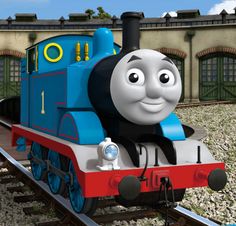 thomas the tank engine is riding on train tracks