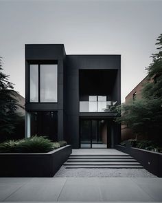 a black building with steps leading to it