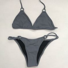 Tigerlily Brazil Triangle Top And Havana Bikini Bottoms With Ring Accents In Washed Graphite Color Size Listed: Us Sizing *Swimwear Items Are Nwt And Stored All Together In An Air Tight Sealed Container, Pulling Them Out May Result In Tag Pull Tiger Lily, Triangle Top, Havana, Blue Gray, Womens Swim, Blue Grey, Brazil, Tights, Swimming