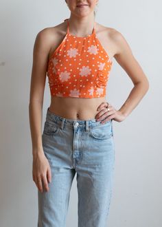 "Hand Made Halter Top Using Vintage 70's Fabric Orange floral pattern Rear tie closure at neck and waist Fits appx. Size XS - M  12\" length" Chic Retro Print Tops For Summer, Chic Fitted Floral Halter Top, Casual Orange Halter Top For Spring, Fitted 70s Inspired Tops For Summer, Chic Orange Halter Top For Spring, Fitted 70s Inspired Summer Tops, Spring Floral Print Fitted Halter Top, Floral Print Fitted Halter Top For Spring, Spring Fitted Retro Halter Top