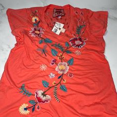 Johnny Was Grace Flutter Sleeve Tee Living Coral Nwt Msrp $150 Womens Size: S Brand New Never Worn With Tags Accepting Offers Summer Floral Embroidered V-neck T-shirt, Flutter Sleeve Cotton Top With Floral Embroidery, Bohemian Flutter Sleeve Tops For Spring, Red Flutter Sleeve Tops For Spring, Bohemian Tops With Floral Embroidery And Flutter Sleeve, Casual Red Blouse With Flutter Sleeves, Spring Red Cotton Top, Red Cotton Spring Tops, Red Tops With Floral Embroidery For Spring