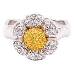 Celebrate your love with this floral-inspired engagement ring, featuring 36 sparkling diamonds (0.30 carats). Each petal is a testament to the extraordinary craftsmanship, with artisans meticulously shaping every detail to capture the lifelike beauty of a flower. Crafted in luxurious 18K yellow gold and platinum (11 grams), this ring symbolizes the joy and love that flourish in a growing relationship. Perfect for an engagement, this ring shines brightest when paired with elegant attire—a flowing Growing Relationship, Ruby Diamond Engagement Ring, 18k Gold Engagement Ring, Vintage Gold Engagement Rings, Flower Engagement, Beautiful Pendant Necklace, Contemporary Engagement Rings, Gold Solitaire Engagement Ring, Flower Engagement Ring