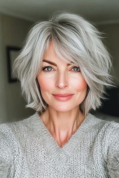 Click for More ➡️ | Save for Later ❤️  A short shag cut with messy layers gives a youthful, carefree look. Silver blonde adds a trendy twist. (Short Shag with Silver Blonde - Hairstyles For Women Over 40 With Fine Hair) Hairstyles For Fine Gray Hair, Youthful Grey Hair, Short Silver Hair Styles, Shag For Wavy Hair Over 50, Woman Over 60 Hairstyles, Hairstyles For Growing Out Gray Hair, Short Gray Hair Edgy Round Face, Shoulder Length Salt And Pepper Hair, Grey Hair With Lowlights Older Women