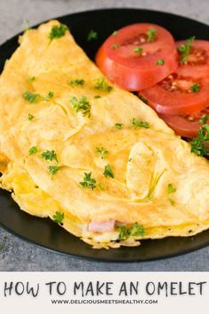 an omelet on a plate with tomatoes and parsley next to a glass of orange juice