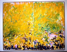 an abstract painting with yellow and green colors