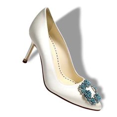 White Satin Almond Toe Pumps Featuring Blue Square Crystal Buckle, Finished With A Stiletto Mid Heel. Never Worn! Size 38 (8) White Chic Shoe Clips For Formal Occasions, Chic White Shoe Clips For Formal Occasion, White Crystal Embellished Shoe Clips For Formal Occasions, White Embellished Shoe Clips For Formal Occasions, White Elegant Shoe Clips For Formal Occasions, Elegant White Shoe Clips For Formal Occasions, Elegant White Formal Shoe Clips, Manolo Blahnik Lurum, Manolo Blahnik Slingback