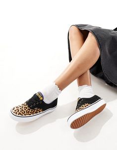 Shoes by Vans Get your kicks Lace-up fastening Low-profile design Signature Vans branding 'Off The Wall' heel tab Durable rubber outsole Signature waffle tread Leopard Print Lace-up Sneakers For Streetwear, Sporty Leopard Print Sneakers For Streetwear, High-top Leopard Print Sneakers For Streetwear, Leopard Print High-top Sneakers For Streetwear, Sporty Sneakers With Leopard Print And Round Toe, Sporty Leopard Print Sneakers With Round Toe, Leopard Print Sneakers With Round Toe And Rubber Sole, Leopard Print Sneakers With Rubber Sole, Sporty Low-top Leopard Print Sneakers