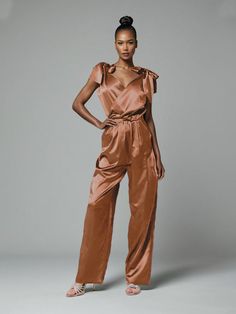 Terracotta Chic Satin V-neck Jumpsuits And Rompers, Chic Satin Jumpsuits And Rompers In Solid Color, Elegant Satin Pantsuit For Evening, Chic Solid Color Satin Jumpsuits And Rompers, Elegant V-neck Evening Pantsuit, Chic Satin Pantsuit For Spring, Elegant Satin Jumpsuits And Rompers For Workwear, Chic Formal Satin Jumpsuits And Rompers, Chic Satin Jumpsuits And Rompers With V-neck