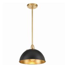 a black and gold pendant light hanging from a ceiling fixture with an oval shade on the top