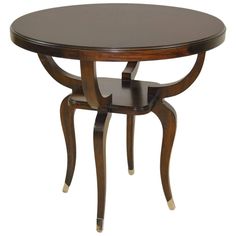 a round wooden table with two legs and a glass top on an isolated white background