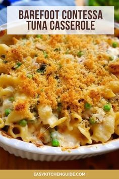 a casserole dish with peas and cheese in it