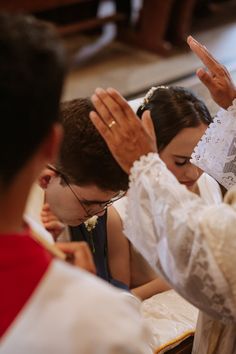 the bride and groom are getting ready to go down the aisle