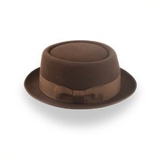 Description Materials Craftsmanship Hat Care Shipping Returns Product Description A Stylish Brown Men's Porkpie Hat Elevate your style with the Soul, a brown men's porkpie hat handcrafted from luxurious rabbit fur felt. Featuring a 3 1/2" telescope crown and a 1 3/4" raw-edge upturned brim, this hat offers a distinctive and sophisticated look. The 1 1/2" grosgrain ribbon hatband adds a touch of classic charm, while the viscose satin lining and genuine leather sweatband ensure all-day comfort and Porkpie Hat, Hats For Big Heads, Outdoor Hut, The Raid, Homburg, Jazz Age, Crown Design, Hat Band, Custom Hats