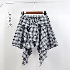 48218397573313 Casual Skirt With Tie Waist For Summer, Plaid Pleated Skort For Summer, Summer Pleated Plaid Skort, Summer Plaid Pleated Skort, Trendy Irregular Skirt For Spring, Summer Plaid Mini Skort, Casual Mini Length Wrap Skirt For Summer, Casual Mini Wrap Skirt For Summer, Casual Summer Mini Wrap Skirt