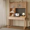 a wooden desk and chair in a room