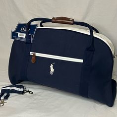 Bnwt Ralph Lauren Travel Carryon/Duffel Bag White Leather Top And Bottom + Brown Leather Accents On Straps And Zippers Comes With Arm Attachable Strap! Gorgeous & In Perfect Condition - Great For Luggage Aesthetic Travel Bag, Ralph Lauren Travel Bag, Impress Your Crush, Ralph Lauren Bag, Luxury Bags Collection, Classy Outfits Men, Skandinavian Fashion, Ralph Lauren Bags, Ralph Lauren Leather