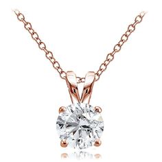 a necklace with a round cut diamond in the center and a chain around it, on a white background