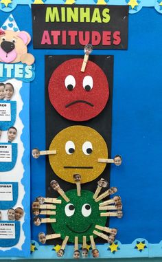 a bulletin board with two different faces on it