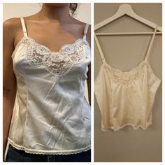 New Without Tags. I Bought This New With Tags Originally, Removed Them, And Then It Sat In My Closet Ever Since & Now It Doesn't Fit I Love This Cami For So Many Reasons! One Is I Was A Big Madonna Fan When I Was A Child, I Love Lace Everything. Ivory Nylon Satin Body With Floral Lace Trim V-Neck, Smaller Scale Lace Trim On Hem And The Back, Adjustable Straps, Soft Material. Intended To Be A Slip, Can Be Worn As Undershirt, Night Shirt Or Just As A Regular Top As I Meant To. Looks Great Tucked In Or Untucked. Flattering Fit 22" Length X 19" Pit-Pit (Length Taken At Full Length The Adjustable Straps Go, So This Can Be Shorter If Desired) Size Says 38 1980's Cream Ivory Sexy Feminine Br Vintage Sleeveless Top With Built-in Bra, Cream Camisole Top With Built-in Bra, Vintage Sleeveless Camisole With Built-in Bra, Vintage Camisole Top For Daywear, Vintage Cami Top For Daywear, Vintage Cami Tank Top With Lace Trim, Vintage Spaghetti Strap Tank Top With Lace Trim, Vintage Tops With Lace Trim And Spaghetti Straps, Vintage Spaghetti Strap Tops With Lace Trim