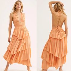 Whether You Live The Beach Lifestyle Year-Round Or Dream Of Making The Great Escape, The Endless Summer Collection Is Full Of Our Most Effortlessly Ethereal Styles Under The Sun. Plunging Neckline Open Back Adjustable Crisscross Straps Smocked Elastic Waistband Tiered Skirt High-Low Hem Slightly Distressed Eges New With Tags; No Flaws Size Small Armpit: Open Waist: Approx. 13.5" Across, Unstretched See My Closet For More Free People & Other Great Brands. Save When Bundling 2 Or More Items! Orange Halter Neck Dress For Brunch, Orange Ruffled Midi Dress For The Beach, Orange Halter Neck Maxi Dress For Spring, Orange Tiered Dress For Brunch, Orange Tiered Beach Dress, Orange Tiered Maxi Dress For Beach, Orange Halter Neck Sundress Midi Dress, Long Black Maxi Dress, The Endless Summer