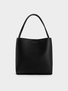 Black Leia Tote Bag | CHARLES & KEITH Eco-friendly Everyday Double Handle Bucket Bag, Charles And Keith Tote Bag, Eco-friendly Black Shoulder Bag With Double Handle, Black Everyday Minimalist Shoulder Bag, Black Minimalist Everyday Shoulder Bag, Eco-friendly Black Shoulder Bag For Shopping, Black Minimalist Daily Shoulder Bag, Minimalist Black Bucket Bag, Eco-friendly Black Bag For Everyday Use