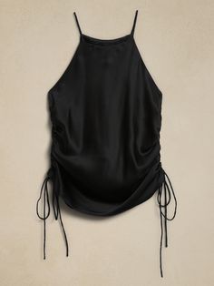 The return of an icon, this '90s inspired, ruched shirt will carry you through all occasions, crafted in a strappy silhouette using our luxuriously soft silk charmeuse, favored for its incredible drape and a subtle sheen.  Plus, our designers opted f Summer Night Out Tops With Ruched Sides, Summer Ruched Sides Top For Night Out, Evening Satin Ruched Tops, Summer Tops With Ruched Sides For Night Out, Elegant Summer Tops With Ruched Back, Chic Ruched Silk Tops, Summer Evening Ruched Blouse, Sleeveless Ruched Silk Top, Sleeveless Silk Ruched Top