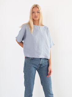 "BEE is a simple loose fitting short sleeve linen top. DETAILS - Boat neckline - Short sleeve - Kimono sleeves - Pullover design - Cropped length - 100% lightweight European linen fabric - Cut and sewn to order just for you in our studio COLOR - Bluestone, you can also choose other colors above - Fabric samples are available here https://www.etsy.com/listing/586569696/linen-fabric-samples SIZING & FIT - Fits true to size - Length is approximately 20 inches / 51.5 cm - Bust (pit to pit) is ap Boxy Fit Short Sleeve Top For Summer, Summer Boxy Fit Short Sleeve Top, Boxy Short Sleeve Relaxed Top, Relaxed Boxy Top With Short Sleeves, Effortless Boxy Short Sleeve Top, Minimalist Short Sleeve Summer Tops, Blue Linen Short Sleeve Top, Blue Linen Crew Neck Top, Blue Linen Tops For Everyday