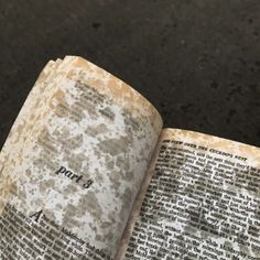 an open book sitting on top of a table