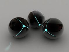 three black balls with glowing blue lights on the top and bottom, sitting next to each other