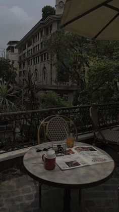 a table with an umbrella on top of it