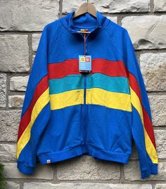 men’s lego color block stripe track jacket XL. Brand new with tags Lego x target collab Great material with soft inside lining Multicolor Cotton Color Block Outerwear, Retro Cotton Color Block Outerwear, Retro Color Block Cotton Outerwear, Multicolor Color Block Track Jacket, Multicolor Color Block Long Sleeve Track Jacket, Multicolor Long Sleeve Color Block Track Jacket, Retro Blue Cotton Track Jacket, Multicolor Patchwork Track Jacket For Sports, Retro Multicolor Color Block Track Jacket