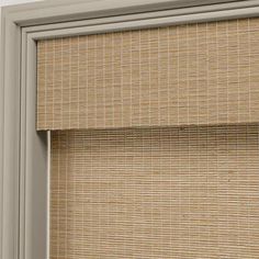 a close up view of a window with the blinds closed