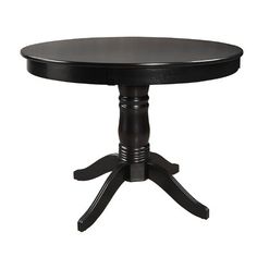 a black round table with four legs on an isolated white background