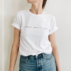 Create great things with this super soft and comfy graphic tee. This essential fits like a well-loved favorite. Easy to style, perfect for layering, and also makes a great gift. Ships separately from other MADISON MARIE products.  retail fit 100% cotton runs true to size S: width = 18in length = 28in M: width = 20in length = 29in L: width = 22in length = 30in XL: width = 24in length = 31in 2XL: width = 26in length = 32in 3XL: width = 28in length = 33in Trendy Cotton T-shirt With Quote Print, Simple Relaxed Fit T-shirt With Graphic Print, Casual Cotton T-shirt With Quote Print, Everyday Cotton T-shirt With Text Print, Relaxed Fit T-shirt With Quote Print For Everyday, Trendy Organic Cotton T-shirt With Letter Print, Inspirational White T-shirt For Everyday, Trendy Cotton T-shirt For Everyday, Minimalist Cotton Top With Graphic Print