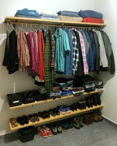 a closet filled with lots of clothes and shoes