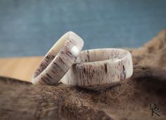 two wedding rings made out of antelope wood