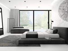 a modern bedroom with black and white decor