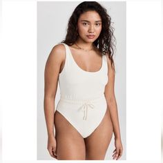 Questions? Leave A Comment Below! Fitted One-piece Cream Swimwear, Fitted Cream One-piece Swimwear, Cream Fitted One-piece Swimwear, Cream Sleeveless Swimwear For Summer, Fitted Beige Bodysuit For Poolside, Beige Beachwear Bodysuit For Summer, Beige Summer Bodysuit For Loungewear, Beige Bodysuit For Summer Loungewear, Beige Summer Beachwear Bodysuit