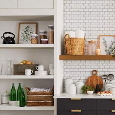 the shelves in this kitchen are filled with dishes and utensils, including bread