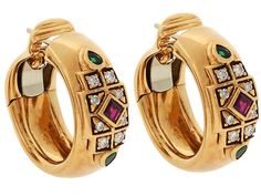 High polish yellow gold hoops feature an exotic pattern at the front composed of diamonds around a central square-cut ruby with a pair of teardrop-shaped emeralds at top and bottom. Emerald And Diamond Earrings, Royal Families Of Europe, Central Square, Ancient Designs, Gold For Sale, Jeweled Earrings, Jewellery Marketing, Ruby Emerald, Cartier Jewelry