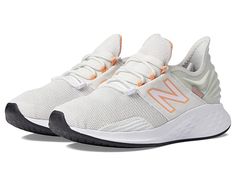 New Balance Fresh Foam Roav - Women's Running Shoes : Nimbus Cloud/Peach Glaze 1 : Set goals and reach milestones with the help of the New Balance Fresh Foam Roav running shoes. Predecessor: N/A. Support Type: Neutral. Cushioning: Lightweight, flexible response. Surface: Road. Differential: 8mm. Lightweight synthetic and breathable mesh upper. Traditional lace-up closure. Lightly padded tongue and collar. Bootie construction for a comfortable fit. Removable insole. Full-length Fresh Foam midsole Sporty White New Balance Running Shoes, Breathable White New Balance Walking Shoes, Breathable New Balance Running Shoes With White Sole, New Balance Breathable White Walking Shoes, New Balance White Breathable Walking Shoes, Comfortable Running Shoes With Ventilation For Sports, Comfortable Running Shoes With Boost Midsole For Workout, White New Balance Running Shoes For Jogging, Light Sports Running Shoes With White Sole