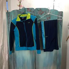 Nwot. Champion Track Suit. Kids Xl 16-18. Can Be Work As Women Adult Xsmall. 100 % Polyester. Fun Vintage Dark Blue With Light Blue And Lime Green On It. Great Condition. Smoke Free Home. Offers Welcome. Shirt Length 23. Pit To Pit 17. Sleeves 20. Pants Waist 15 Length 46 1/2. Pant Leg Width 8 1/2 Inseam 9. Blue Stretch Cotton Sets, Blue Stretch Sets For Winter, Blue Stretch Athleisure Set, Blue Sports Sets For Winter, Blue Sportswear Sets For Winter, Blue Sportswear Loungewear Sets, Winter Sports Sets In Blue, Blue Winter Sports Sets, Blue Winter Sports Set