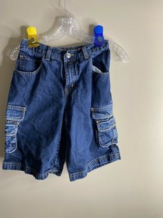 Vintage Jordan 1982 cargo shorts kid Jordan Size XL denim 100% Cotton Cargo Pockets Back elastic waist Rare! 11”- across waist laying flat 10”- front rise 10”- inseam Excellent condition- no signs of wear or flaws Medium Wash Cotton Jean Shorts With Cargo Pockets, Denim Cargo Shorts With Multiple Pockets, Medium Wash Cargo Shorts, Vintage Cotton Cargo Shorts With Pockets, 90s Style Short Jeans With Pockets, 90s Style Short Jeans, 90s Style Cotton Jean Shorts With Pockets, 90s Denim Shorts With Pockets, Shorts For Kids